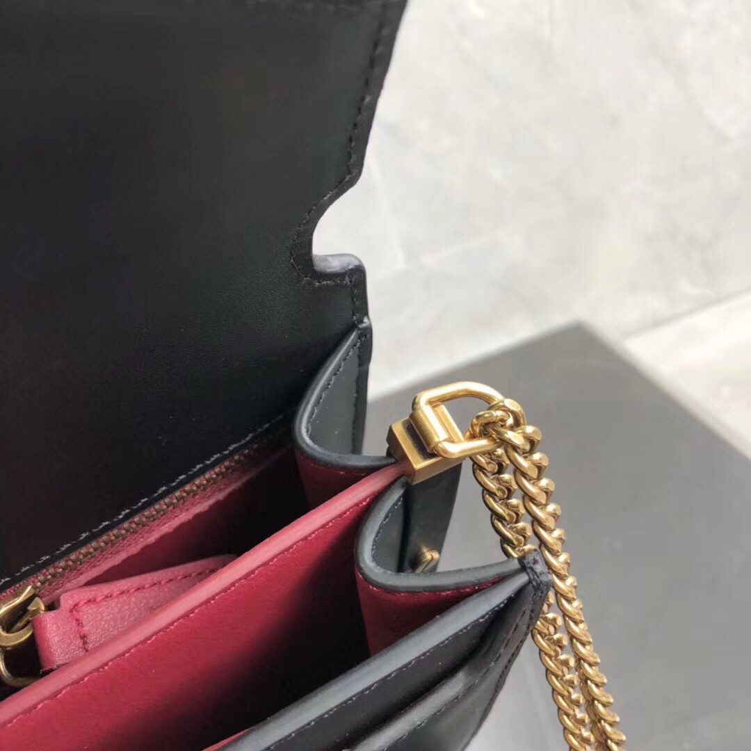 Sa**t Lau*nt black cassandra monogram clasp bag