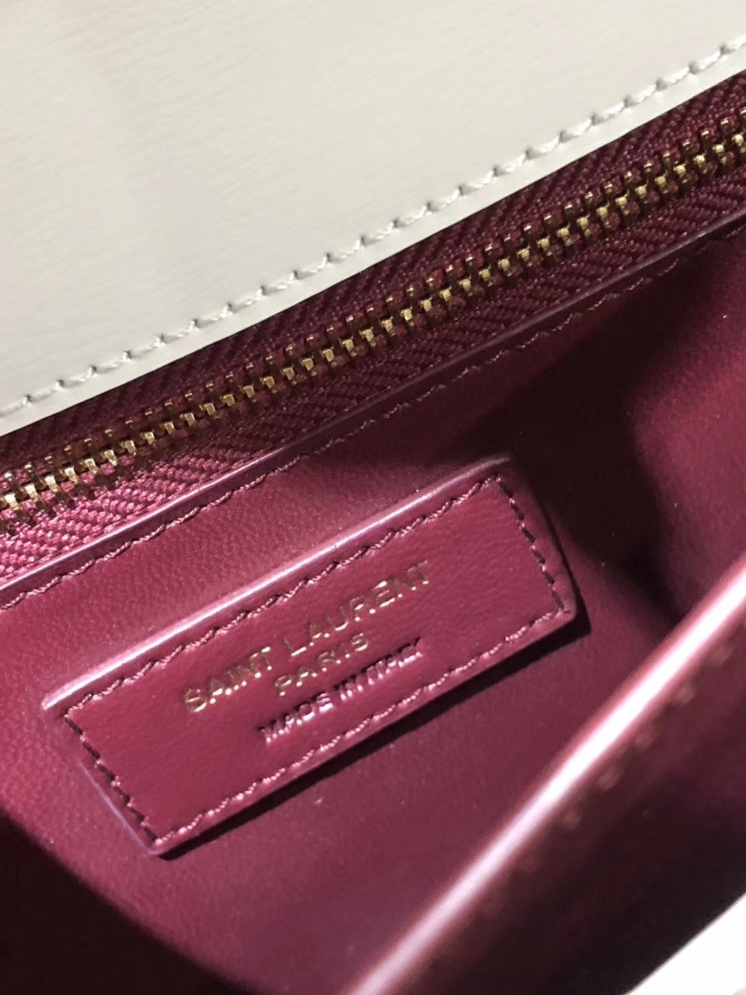 Sa**t Lau*nt blanc cassandra monogram clasp bag
