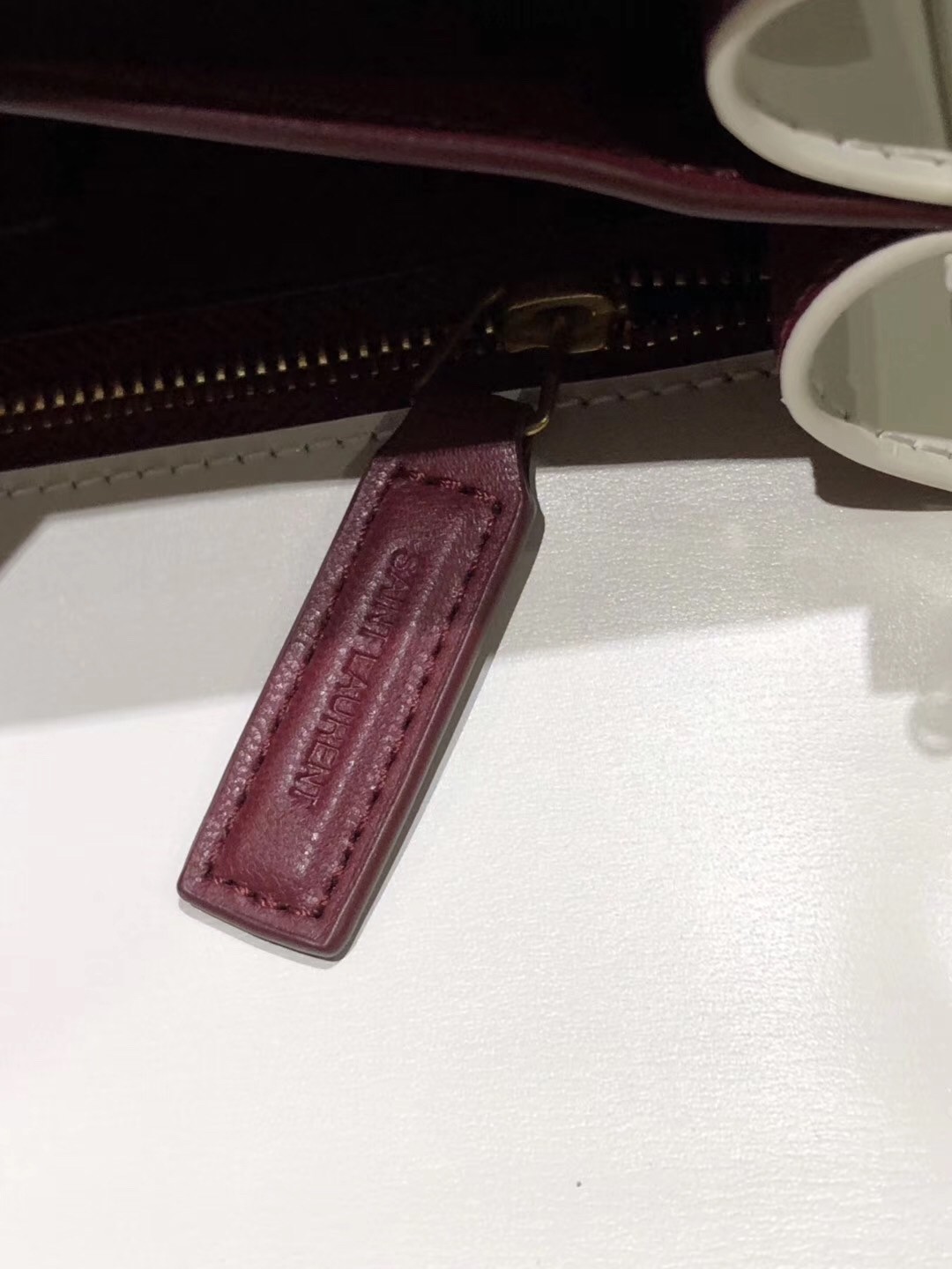 Sa**t Lau*nt blanc cassandra monogram clasp bag