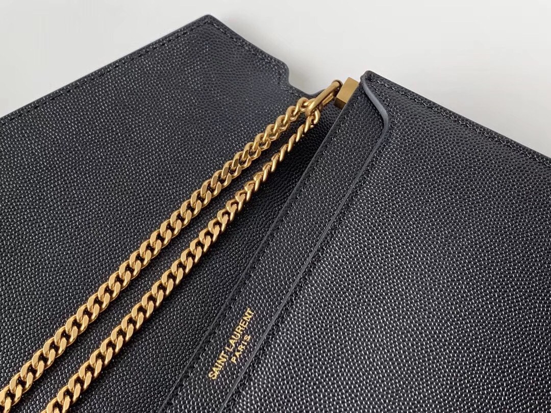 Sa**t Lau*nt cassandra clasp bag in black grained leather