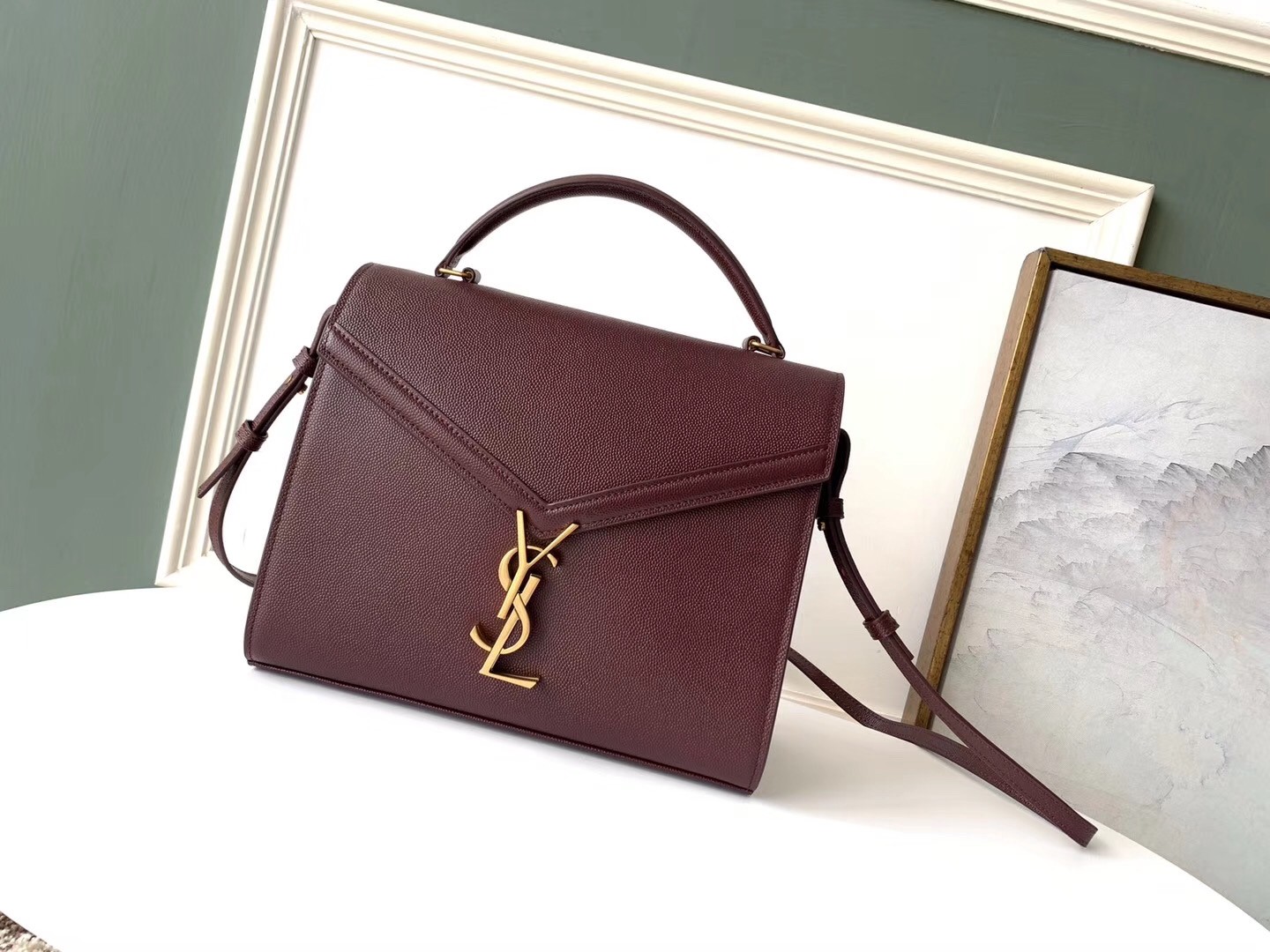 Sa**t Lau*nt cassandra medium bag in bordeaux grained leather