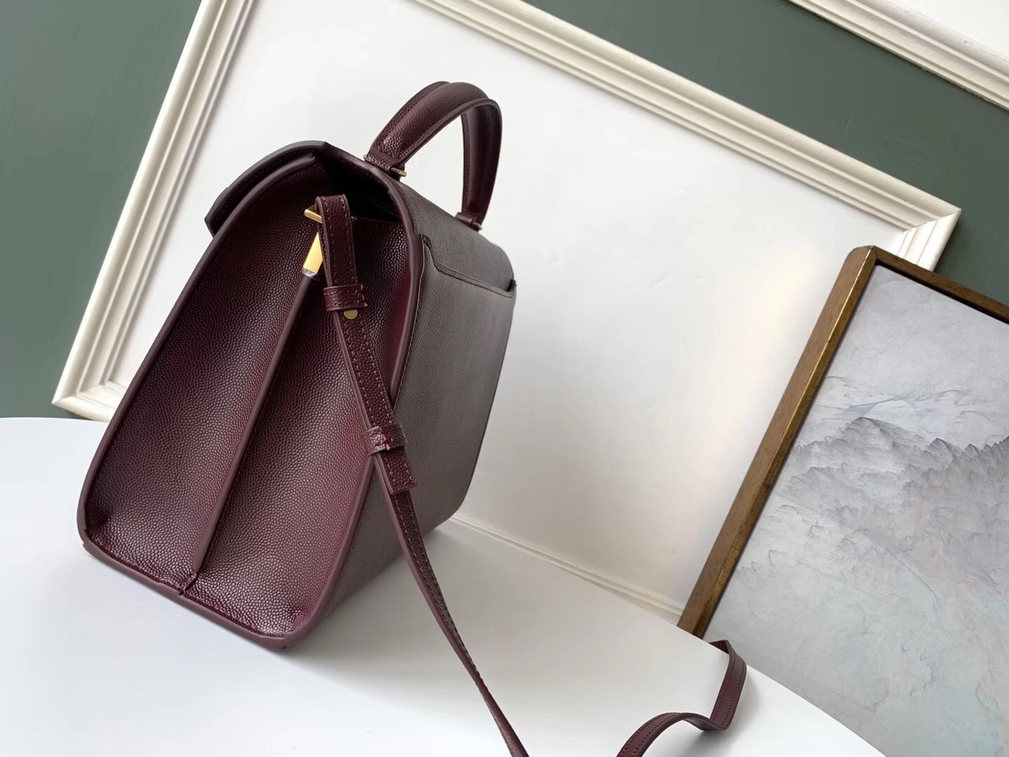 Sa**t Lau*nt cassandra medium bag in bordeaux grained leather