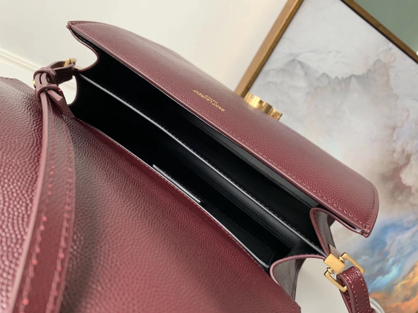 Sa**t Lau*nt cassandra medium bag in bordeaux grained leather