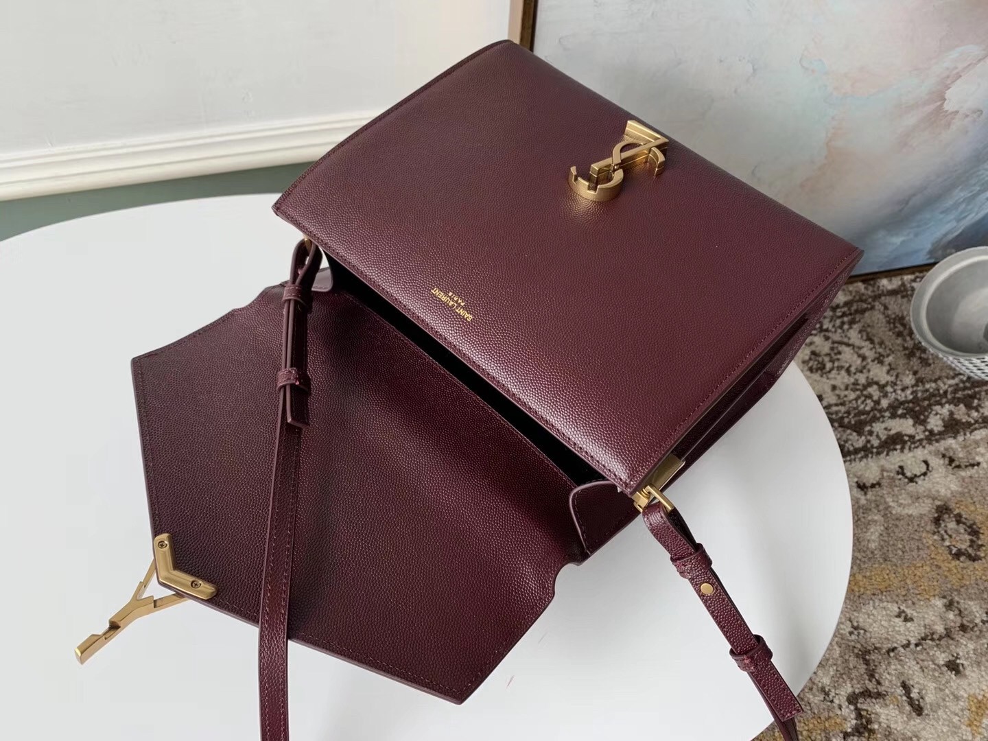 Sa**t Lau*nt cassandra medium bag in bordeaux grained leather