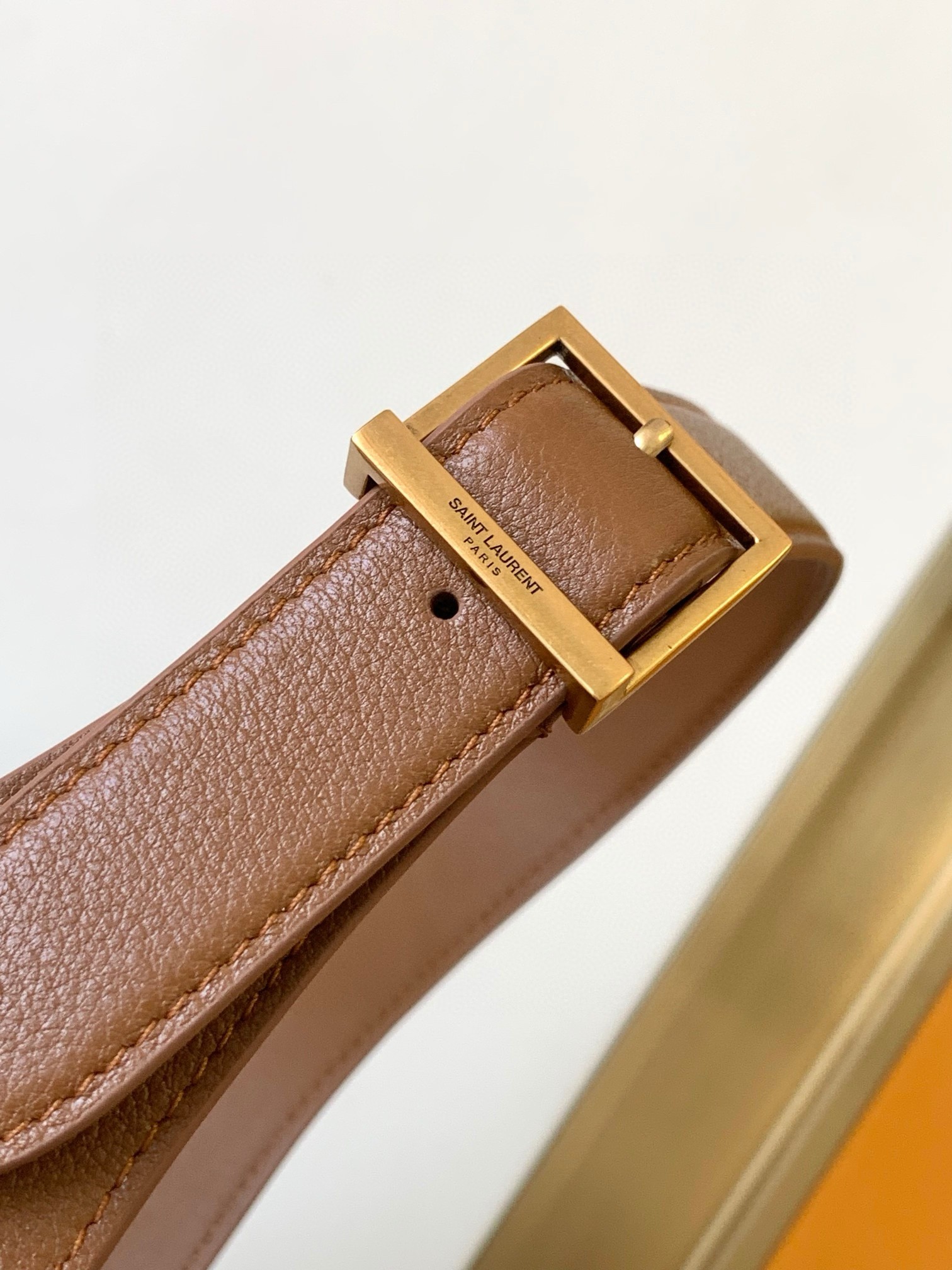 Sa**t Lau*nt le 5 À 7 s*pple small hobo bag in brown leather