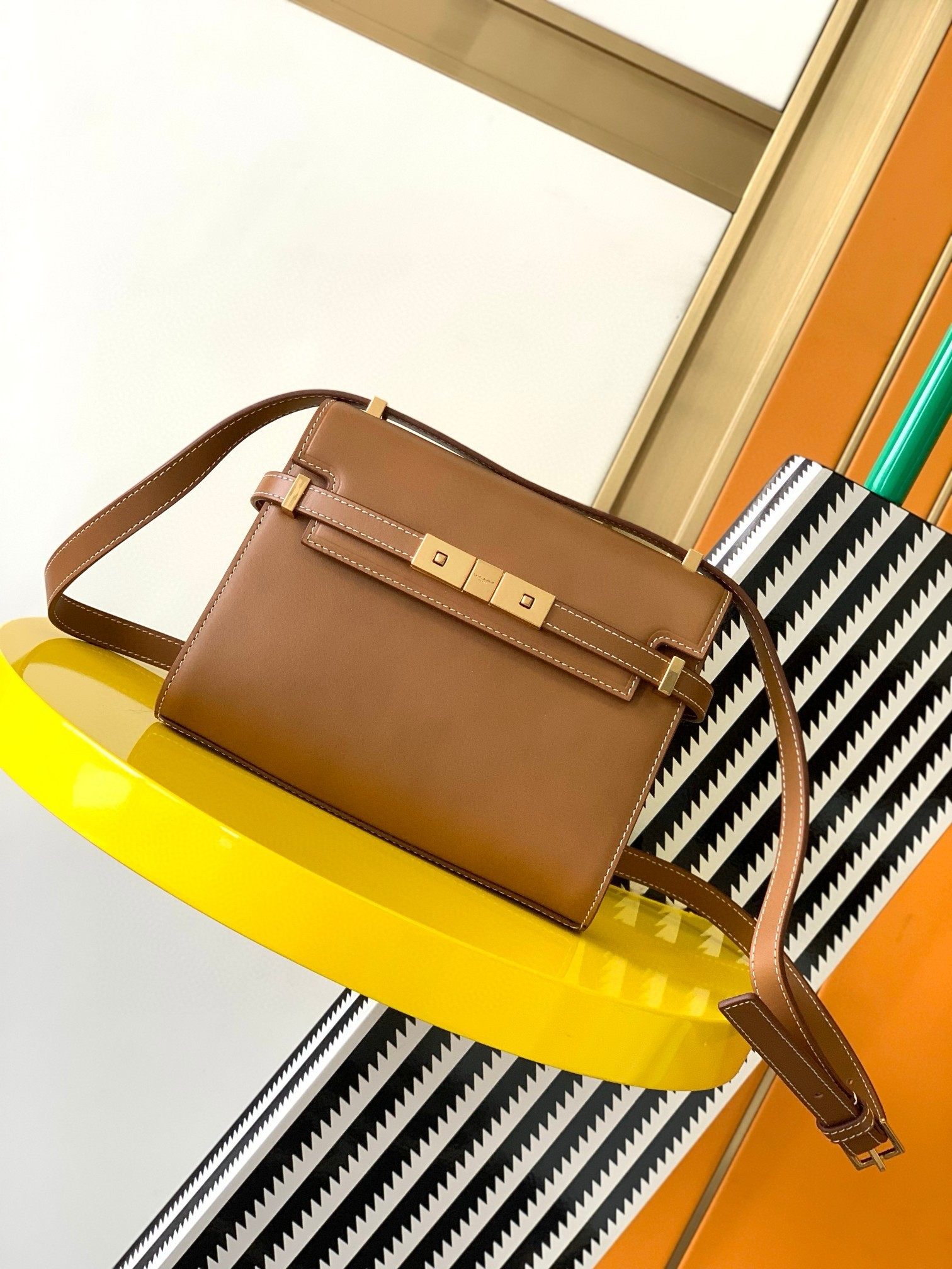 Sa**t Lau*nt manhattan mini shoulder bag in brown calfskin
