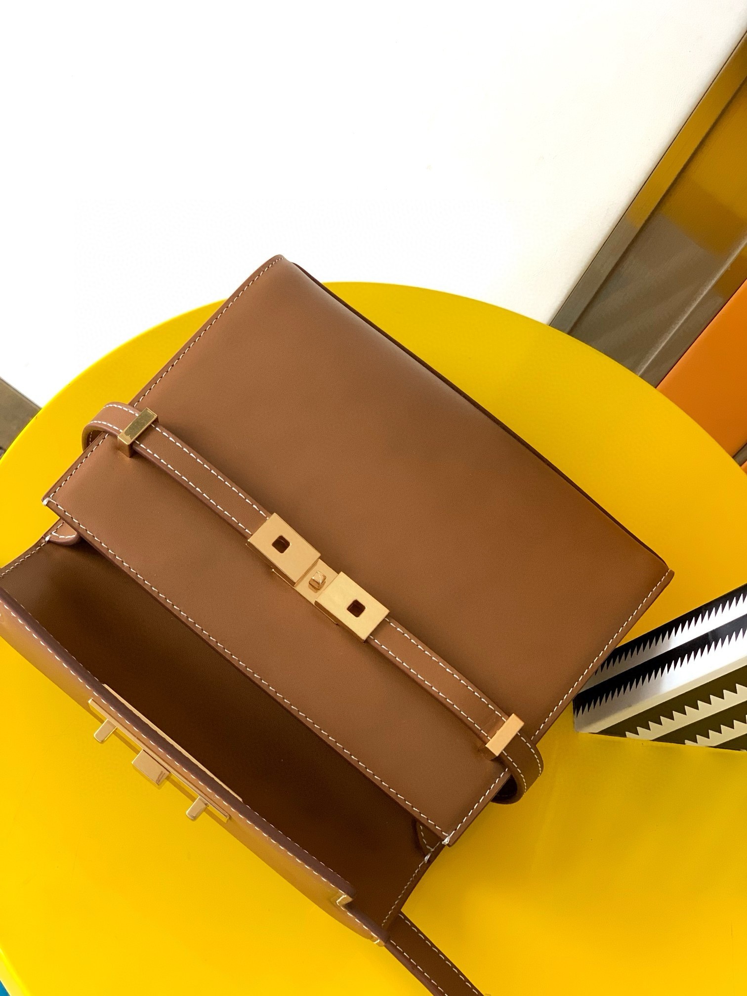 Sa**t Lau*nt manhattan mini shoulder bag in brown calfskin