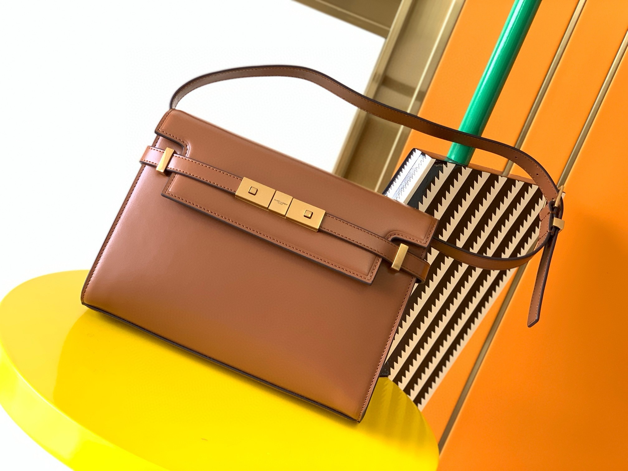 Sa**t Lau*nt manhattan small shoulder bag in brown calfskin