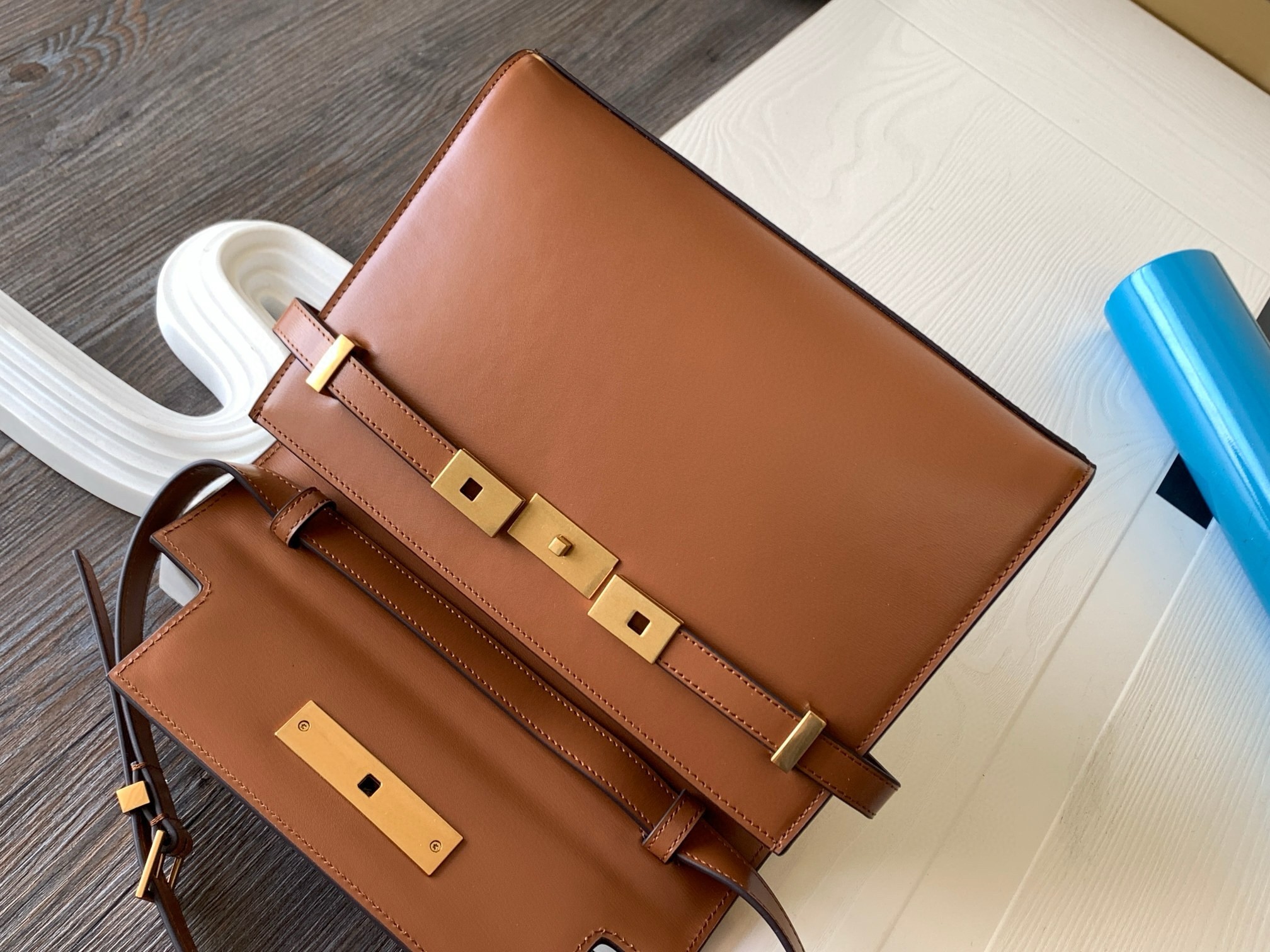 Sa**t Lau*nt manhattan small shoulder bag in brown calfskin