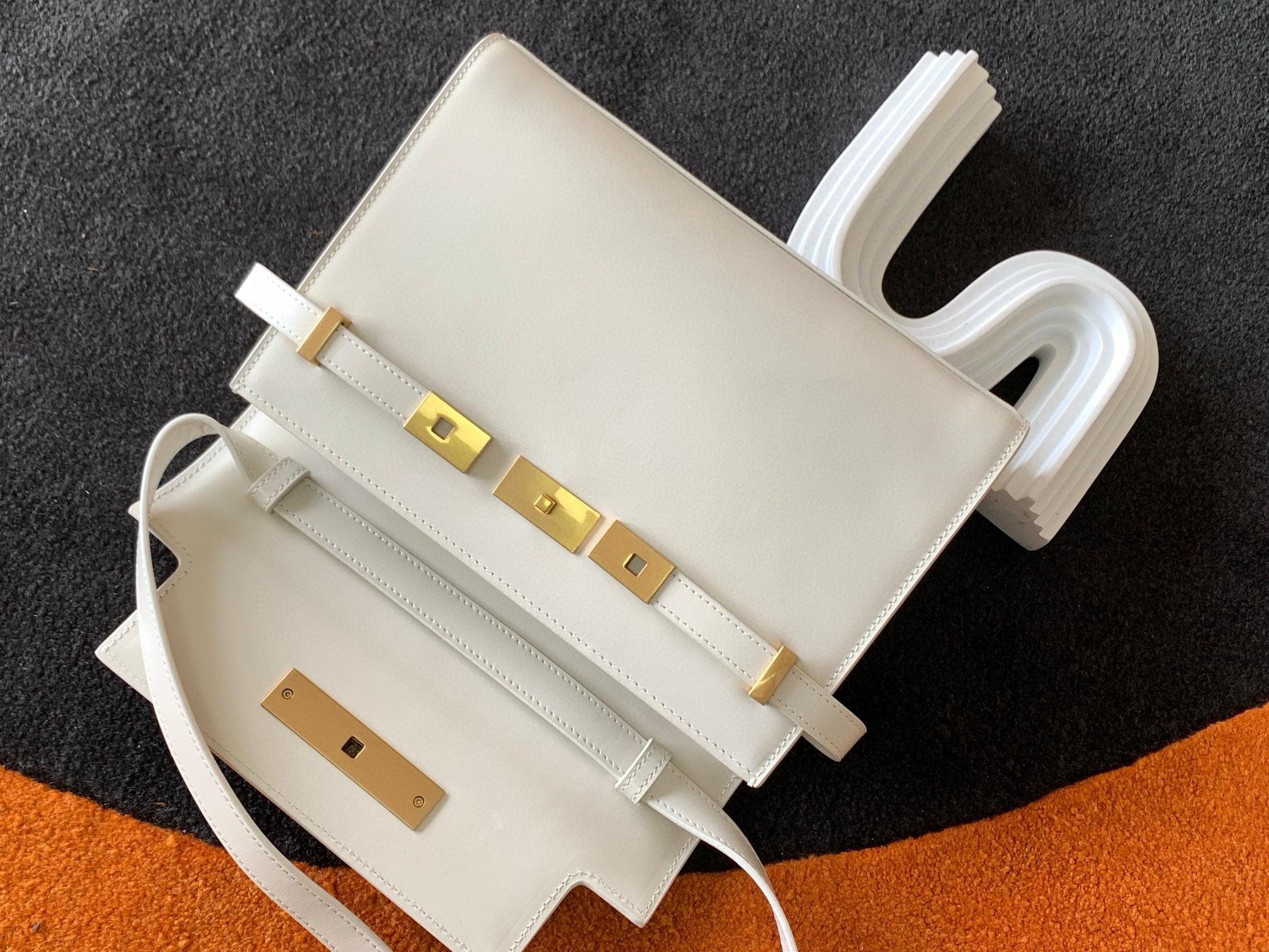 Sa**t Lau*nt manhattan small shoulder bag in white calfskin