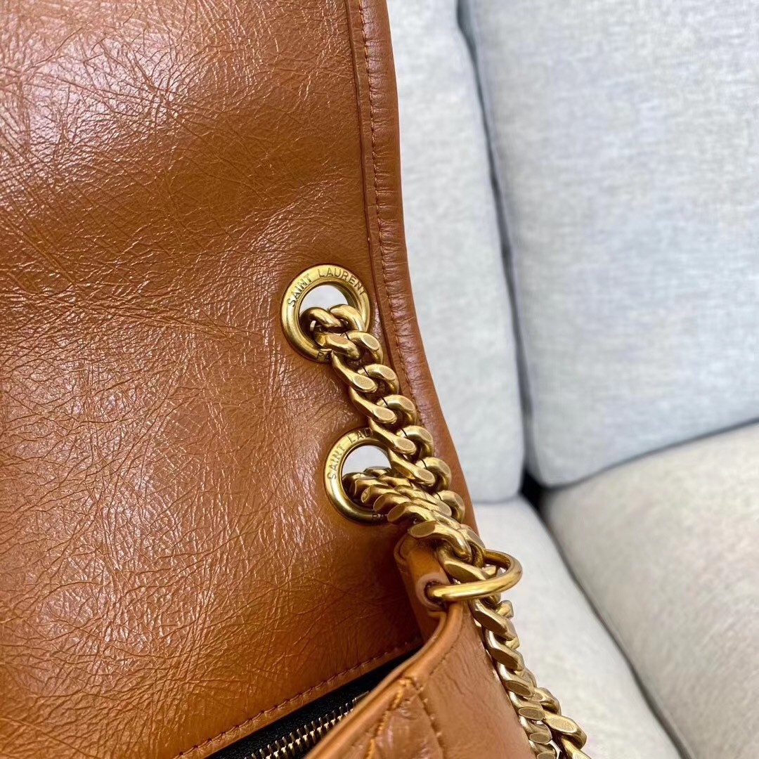 Sa**t Lau*nt medium niki bag in brown calfskin