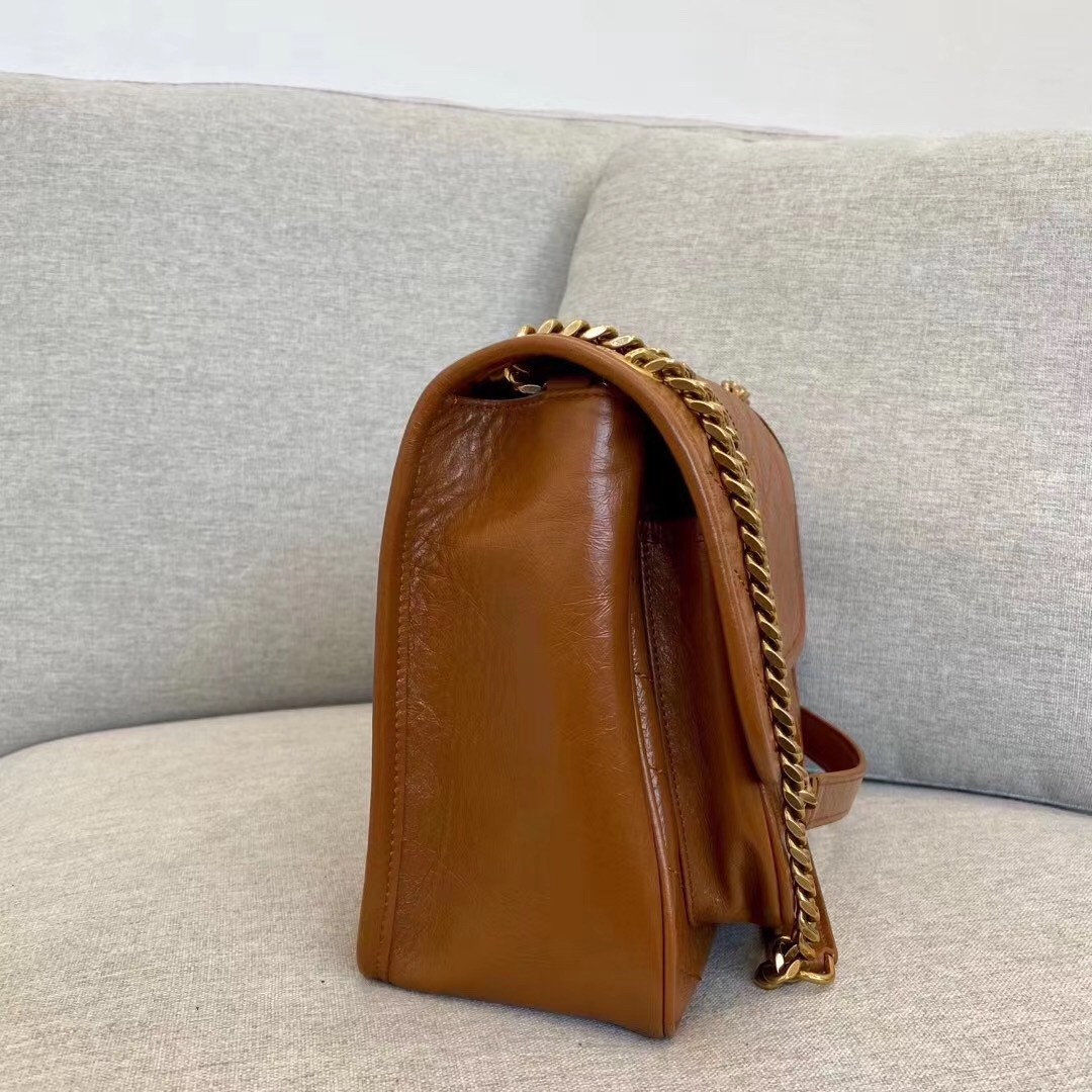Sa**t Lau*nt medium niki bag in brown calfskin