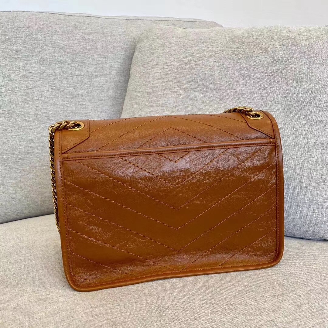 Sa**t Lau*nt medium niki bag in brown calfskin