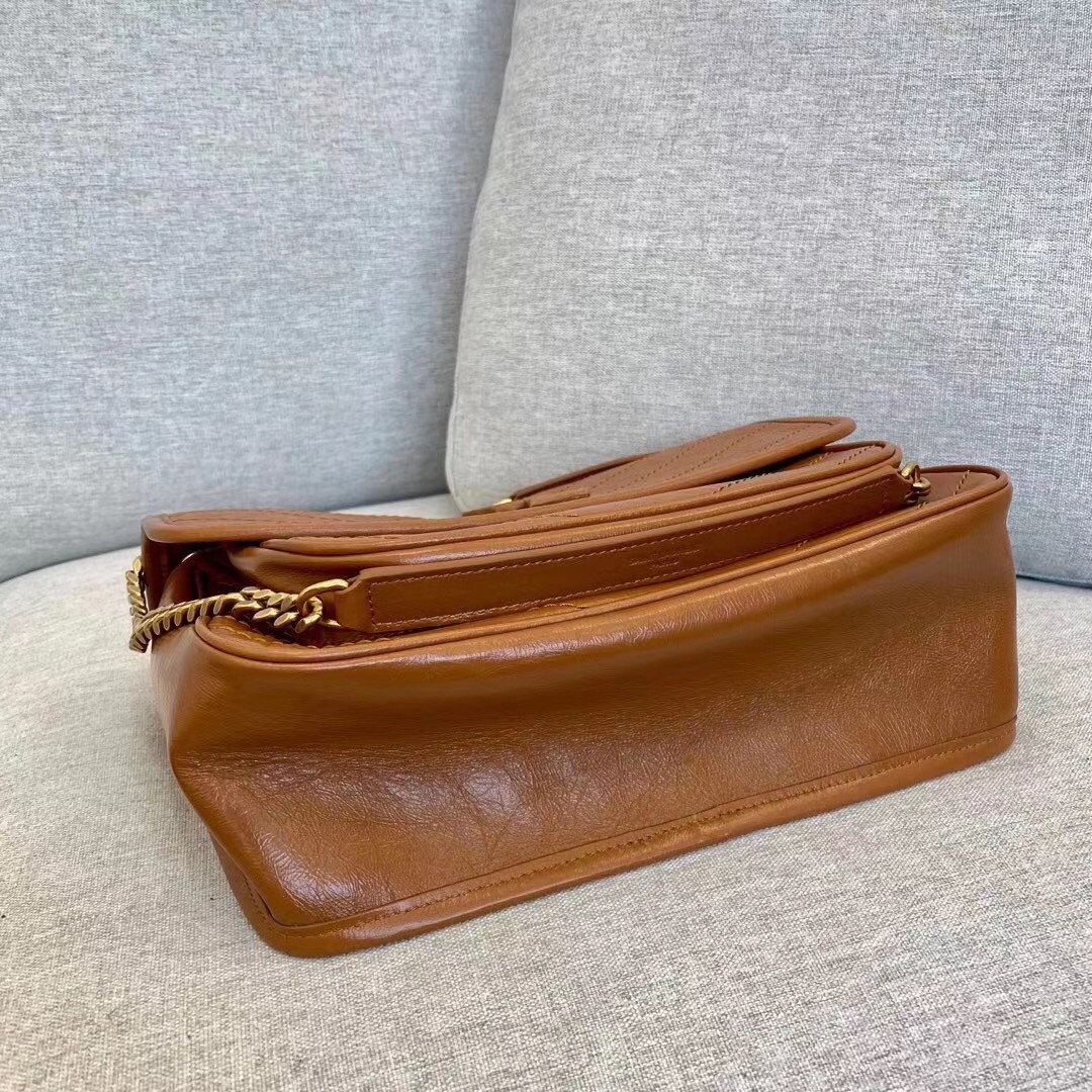 Sa**t Lau*nt medium niki bag in brown calfskin