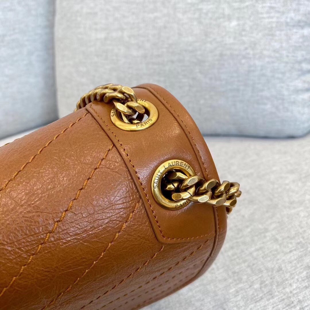 Sa**t Lau*nt medium niki bag in brown calfskin