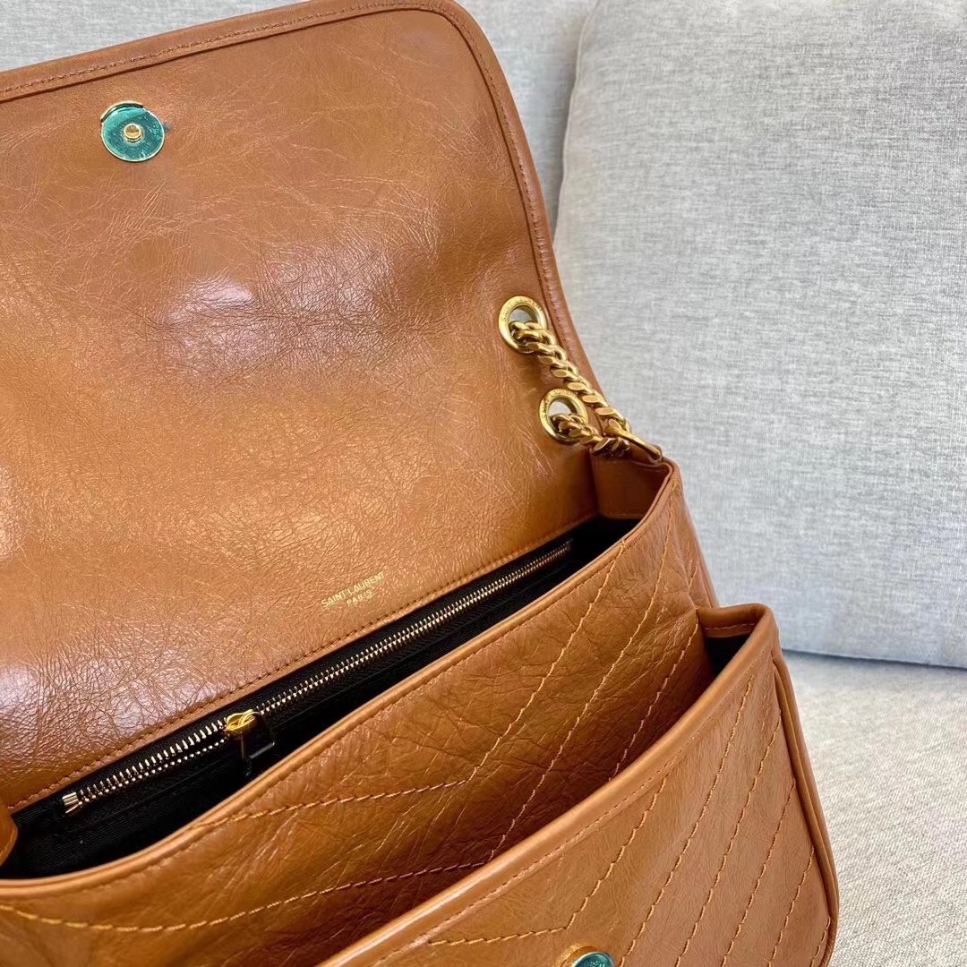 Sa**t Lau*nt medium niki bag in brown calfskin