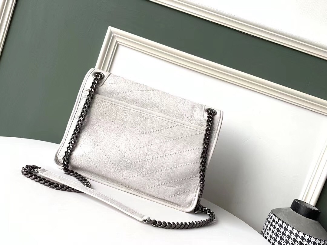 Sa**t Lau*nt medium niki bag in white crinkled leather