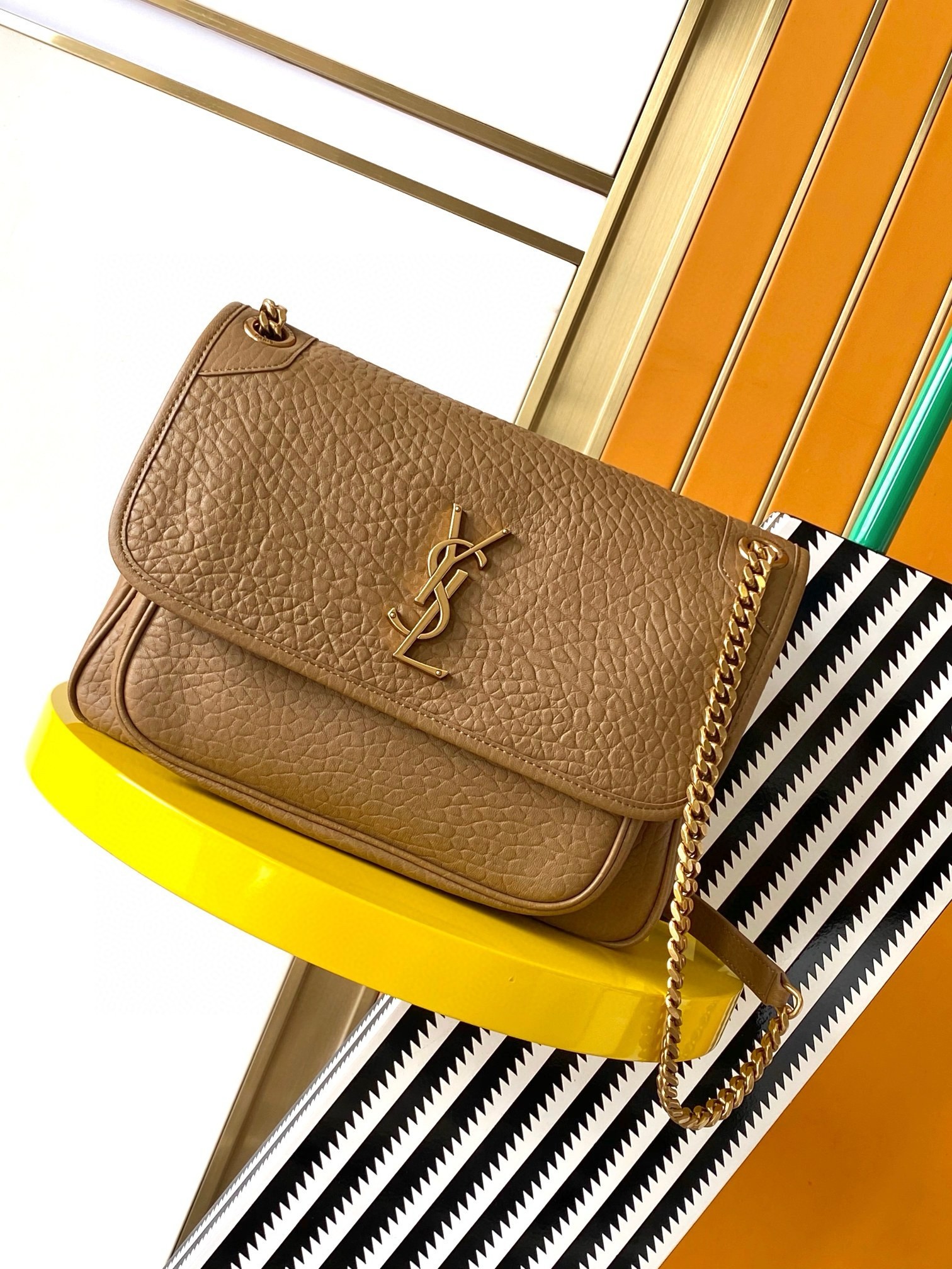 Sa**t Lau*nt niki medium chain bag in dark cork grained lambskin