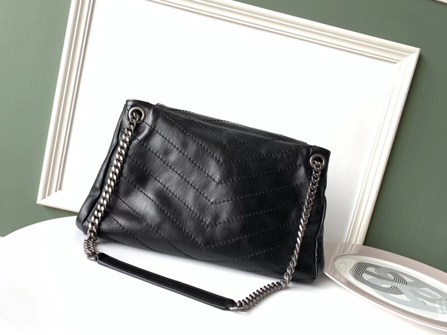 Sa**t Lau*nt nolita medium bag in black quilted leather