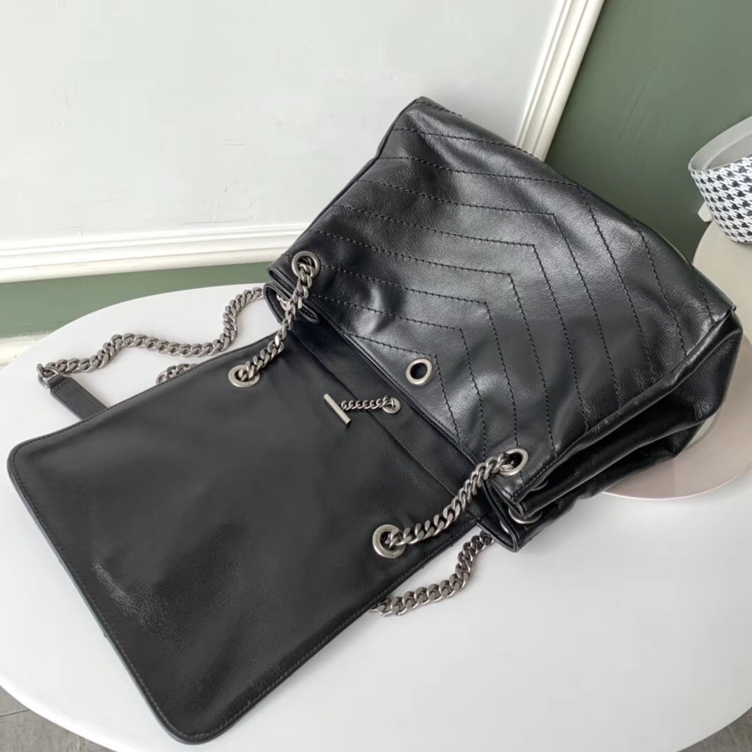 Sa**t Lau*nt nolita medium bag in black quilted leather