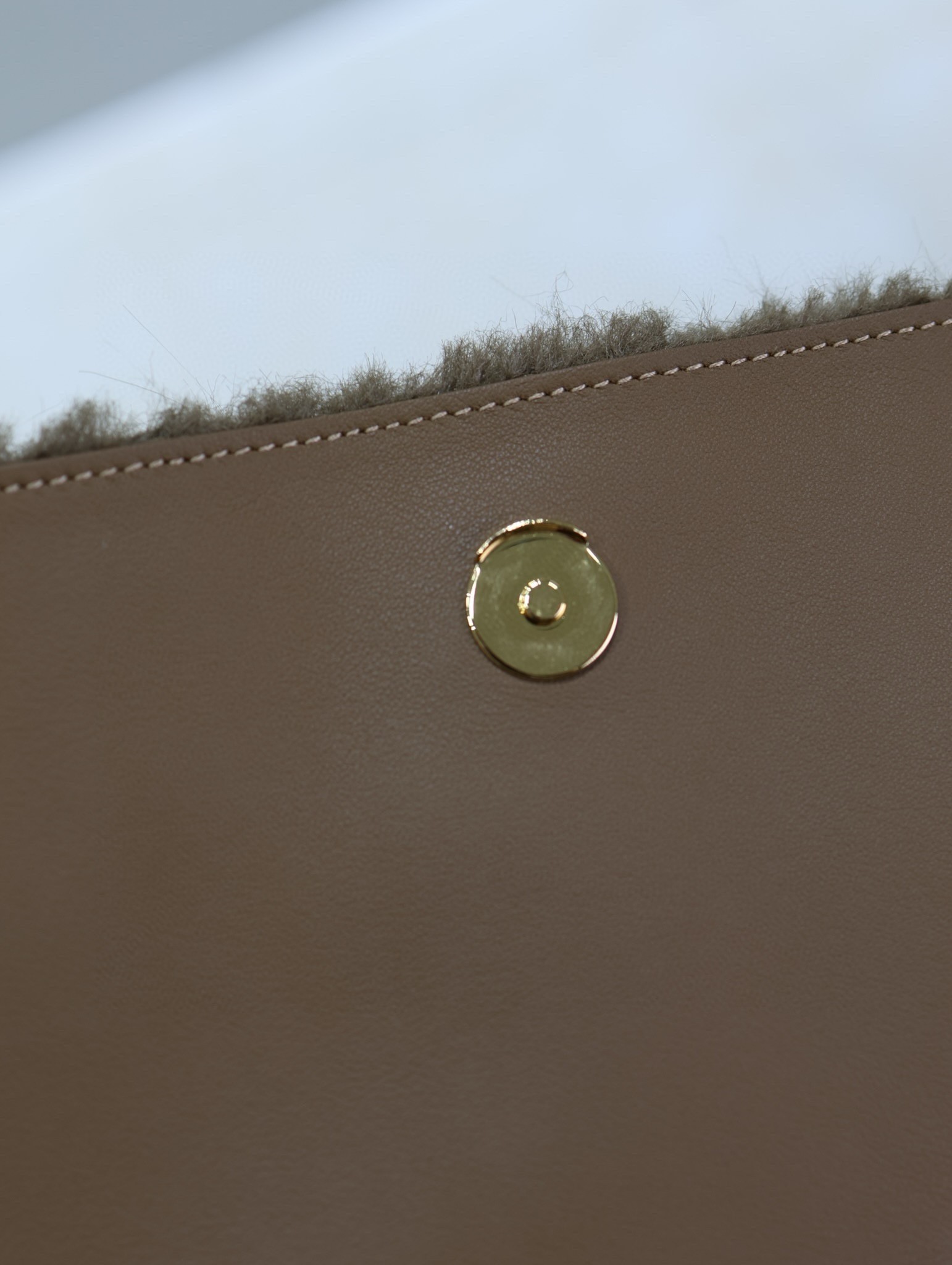 Sa**t Lau*nt niki oversized shoulder bag in brown shearling