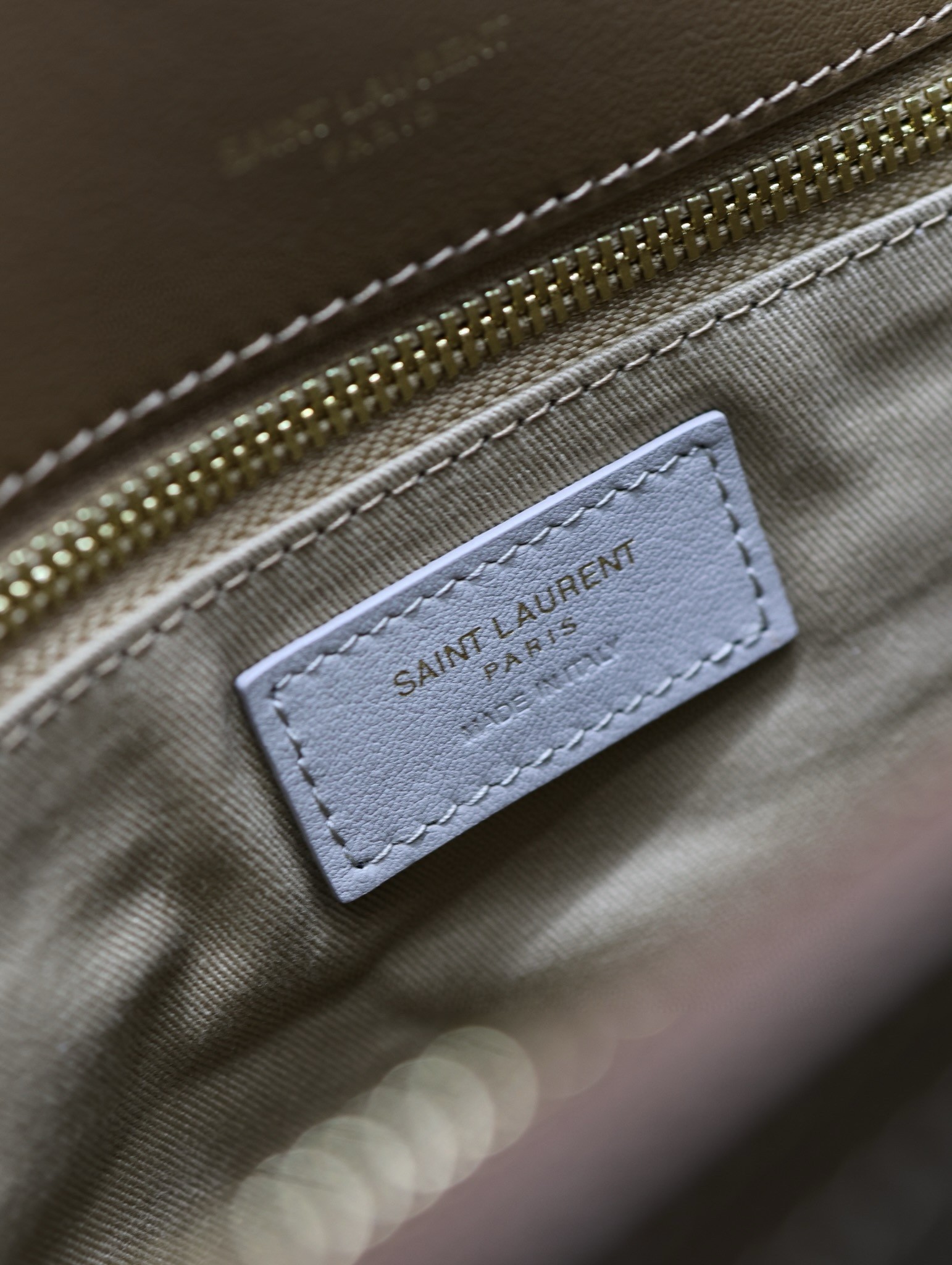 Sa**t Lau*nt niki oversized shoulder bag in brown shearling