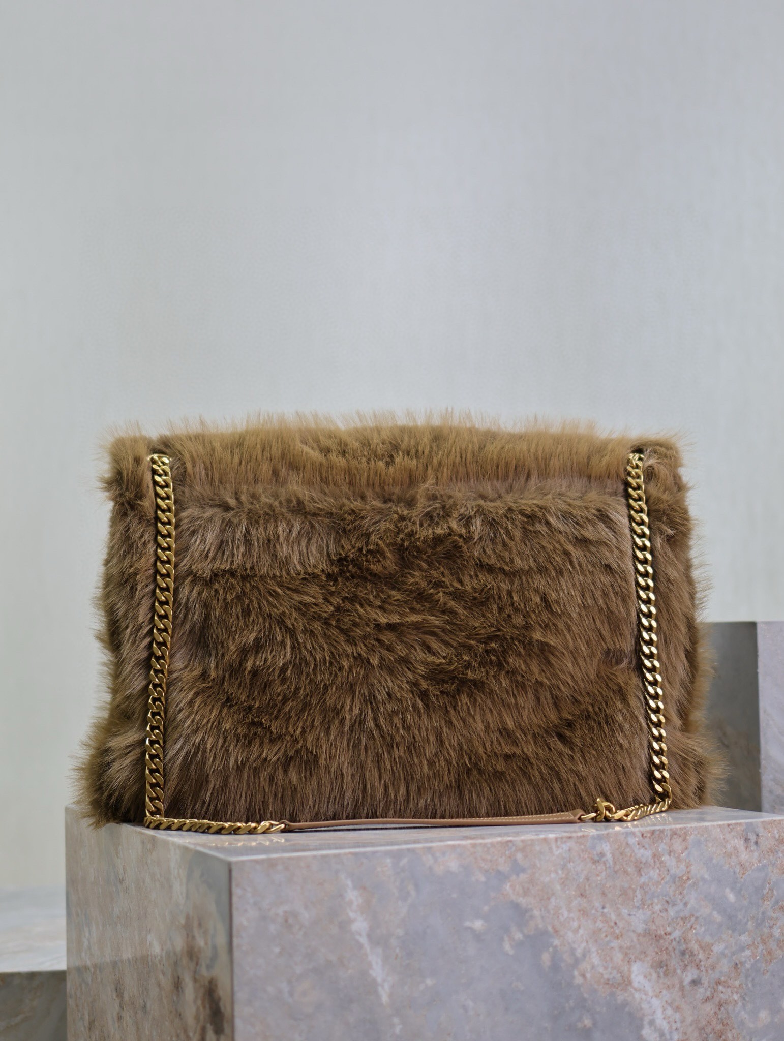 Sa**t Lau*nt niki oversized shoulder bag in brown shearling