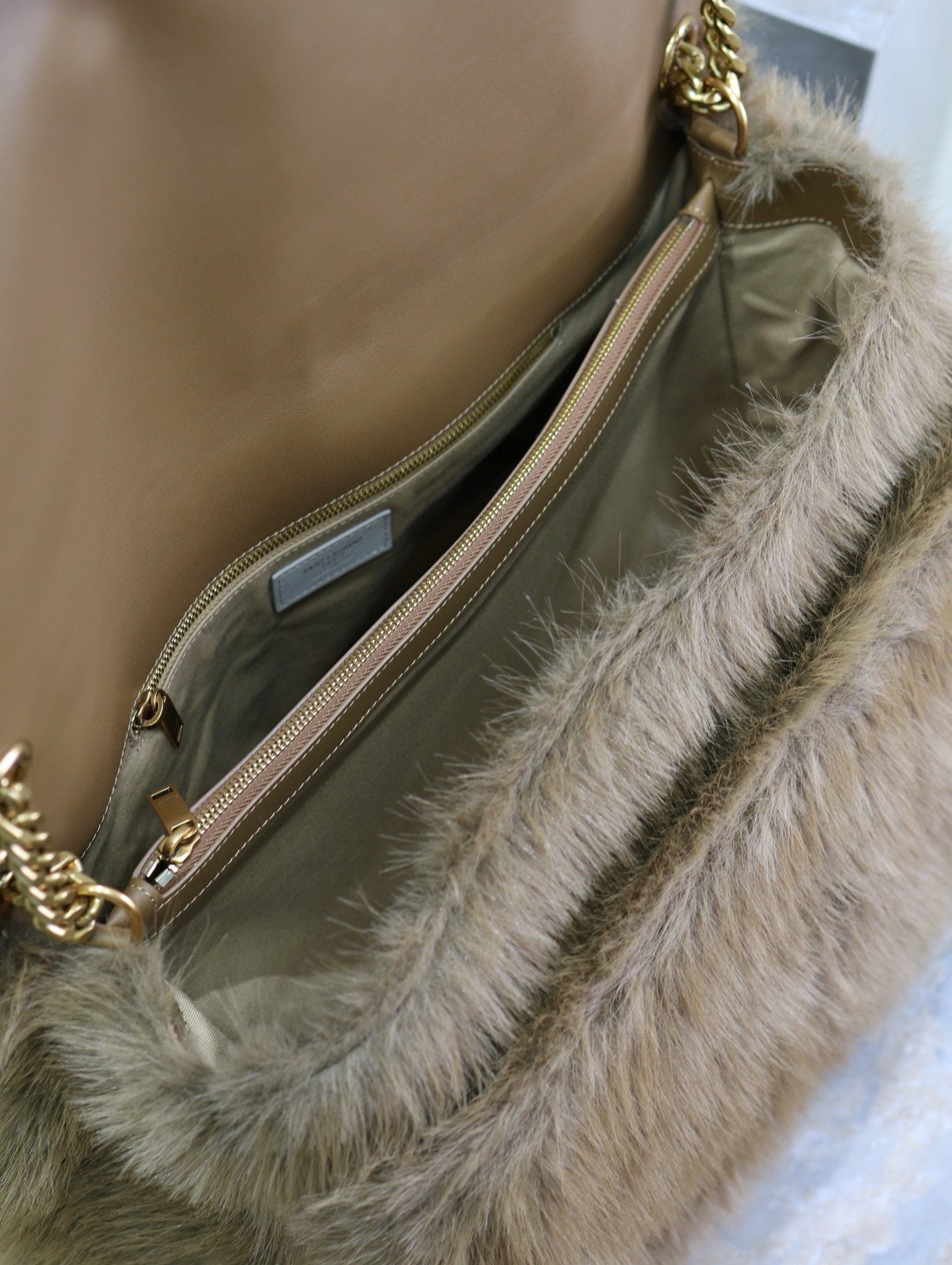 Sa**t Lau*nt niki oversized shoulder bag in brown shearling