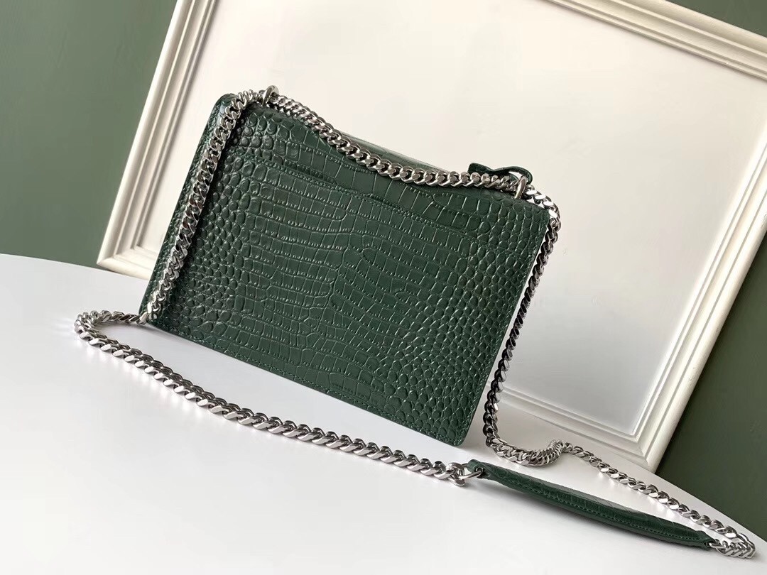 Sa**t Lau*nt sunset medium bag in green crocodile embossed leather