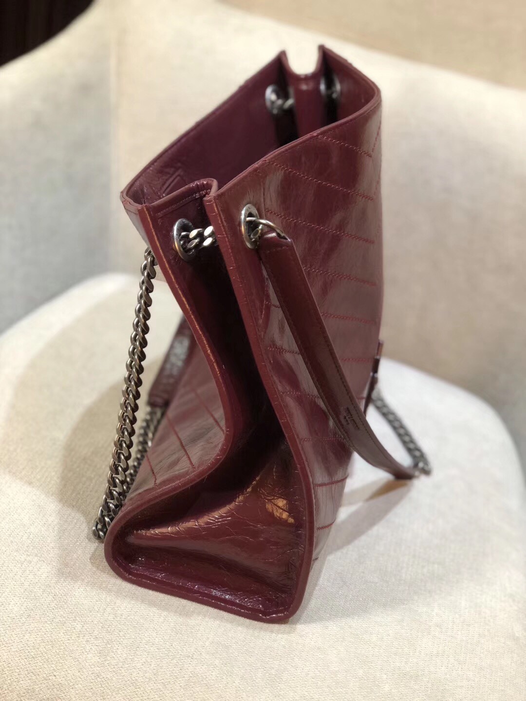 Sa**t Lau*nt medium niki shopping bag in bordeaux leather
