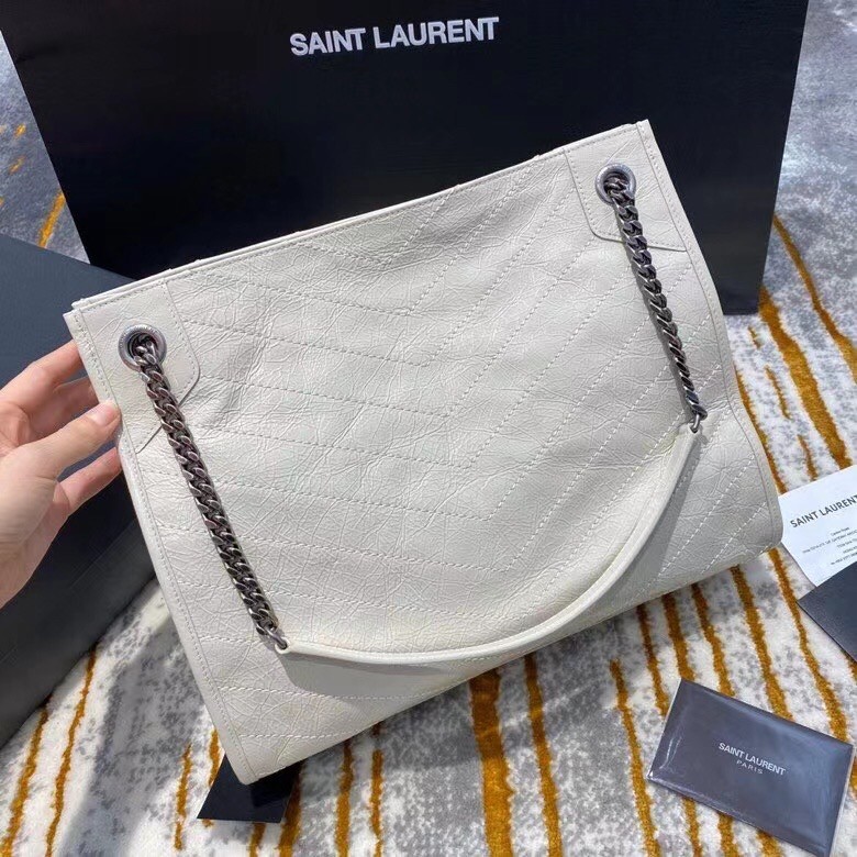 Sa**t Lau*nt medium niki shopping bag in white leather