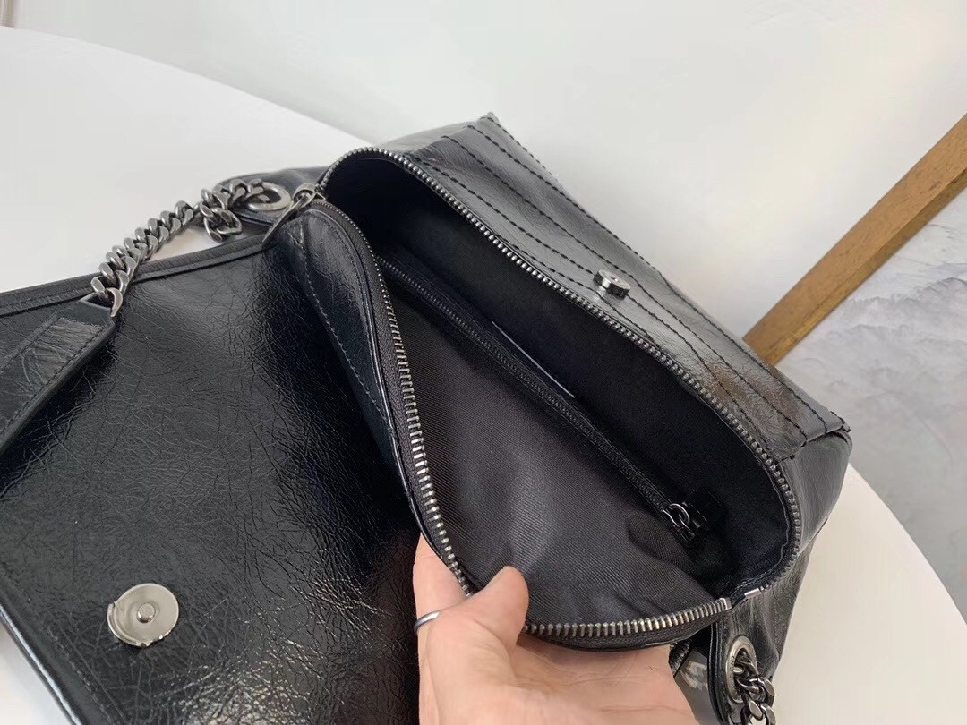 Sa**t Lau*nt niki body bag in black crinkled vintage leather