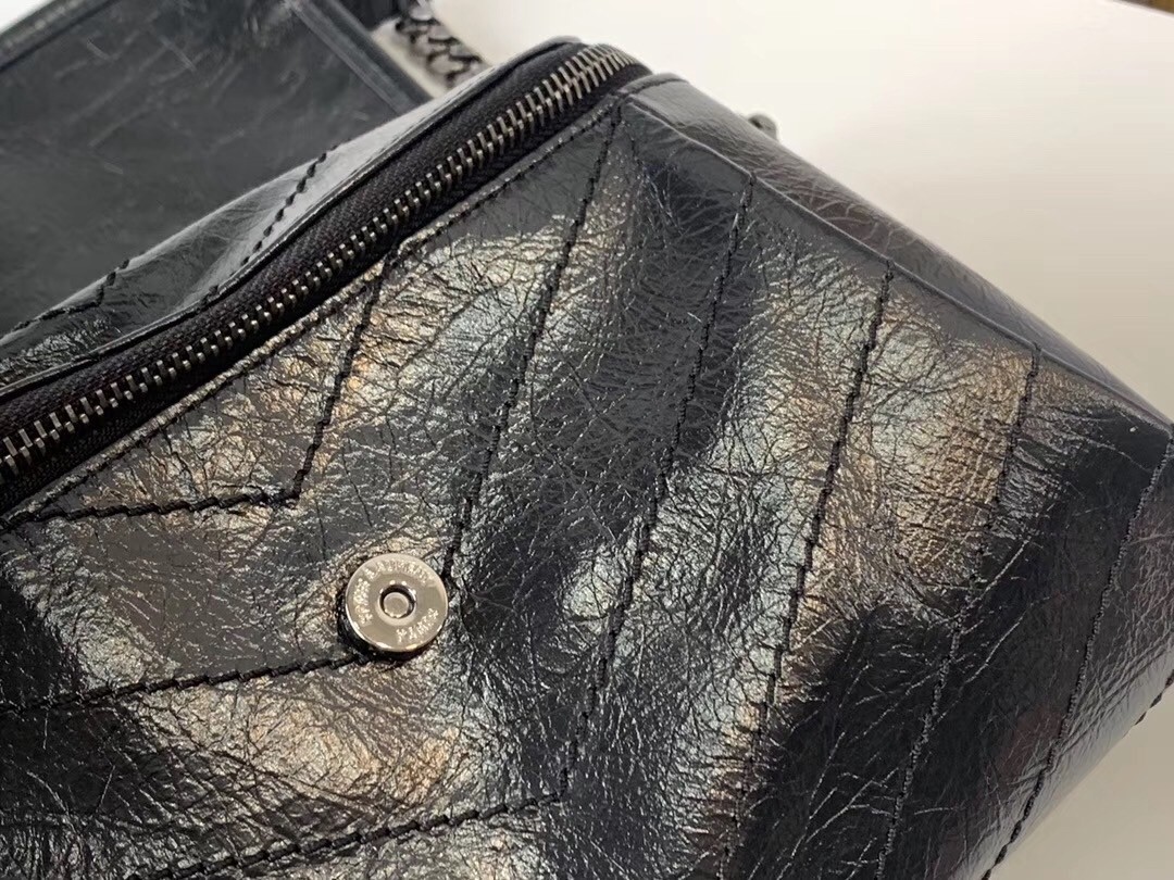 Sa**t Lau*nt niki body bag in black crinkled vintage leather