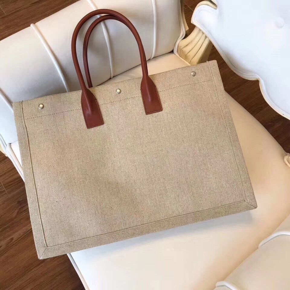 Sa**t Lau*nt rive gauche tote bag with tan handle