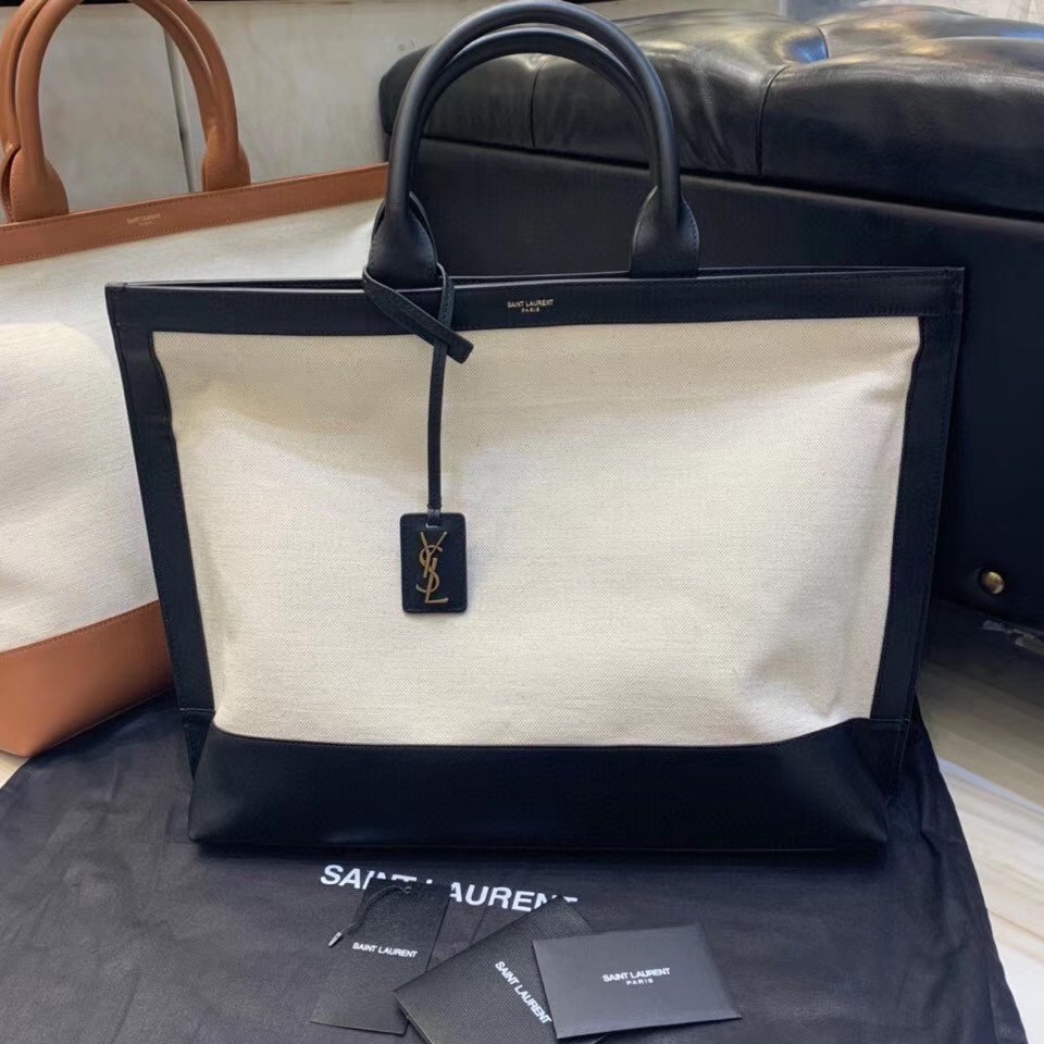 Sa**t Lau*nt tag shopping bag in canvas and black leather