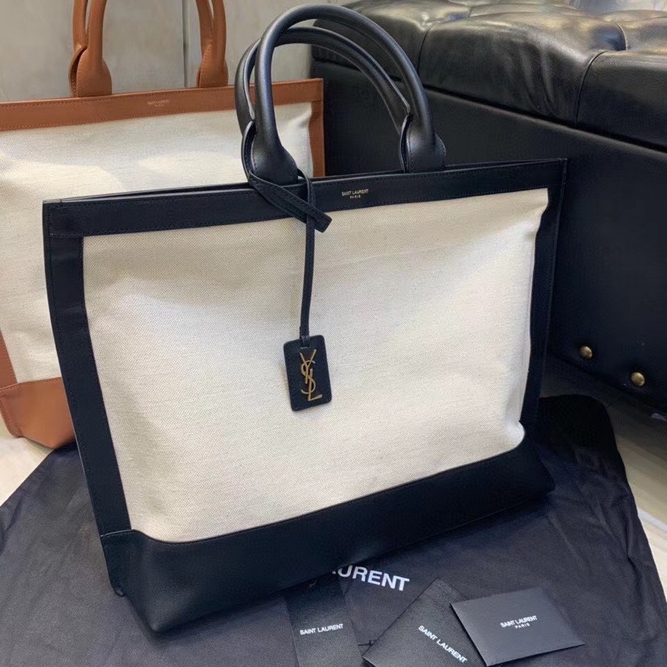 Sa**t Lau*nt tag shopping bag in canvas and black leather