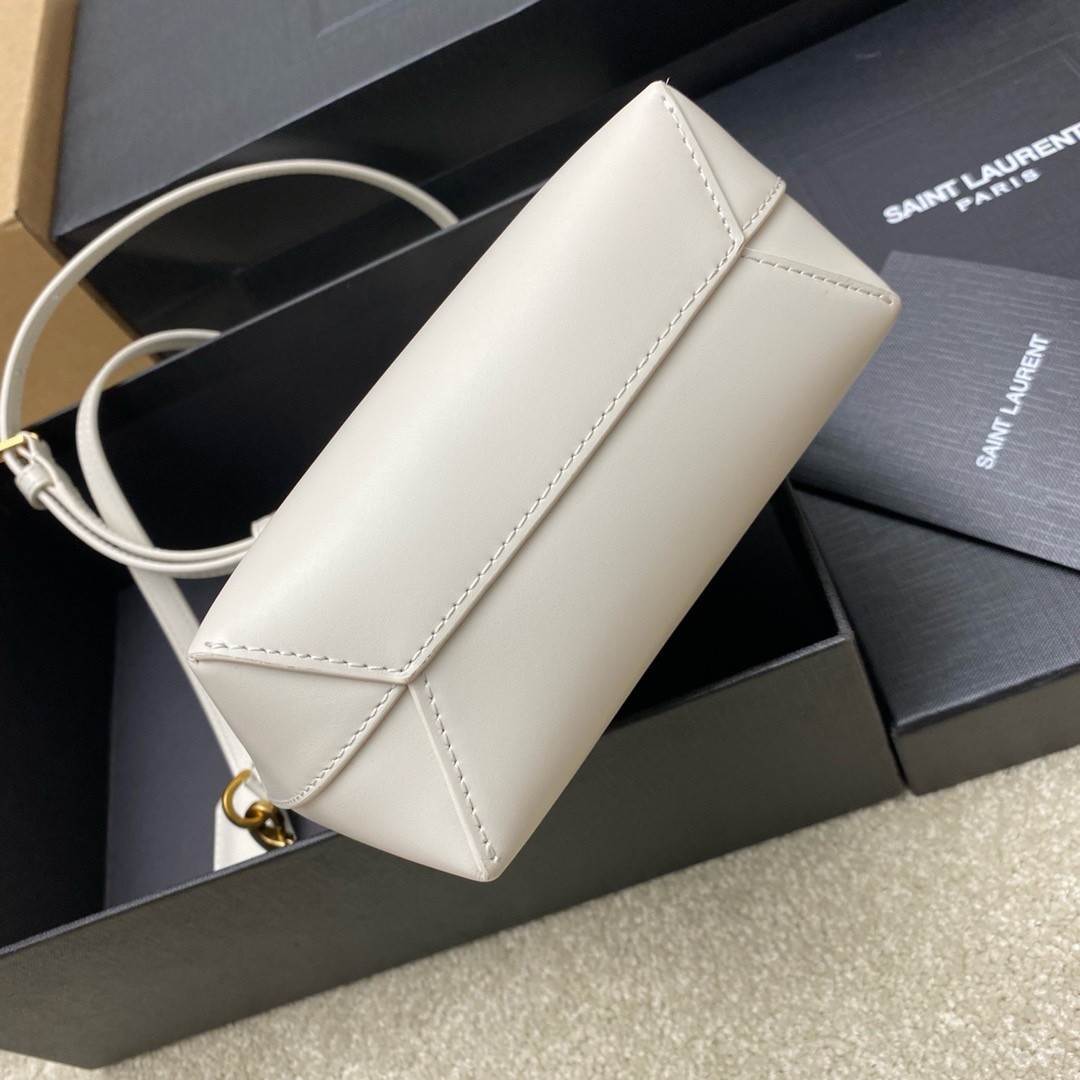 Sa**t Lau*nt mini toy shopping bag in white calfskin