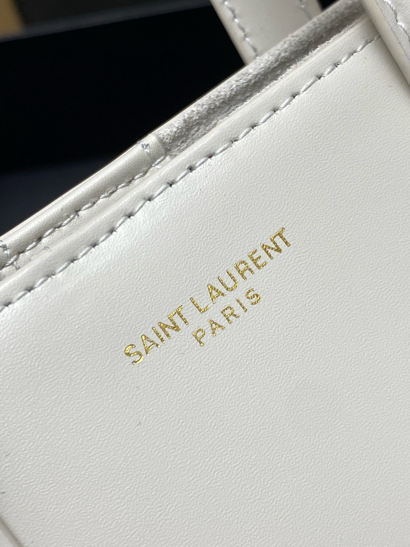 Sa**t Lau*nt mini toy shopping bag in white calfskin