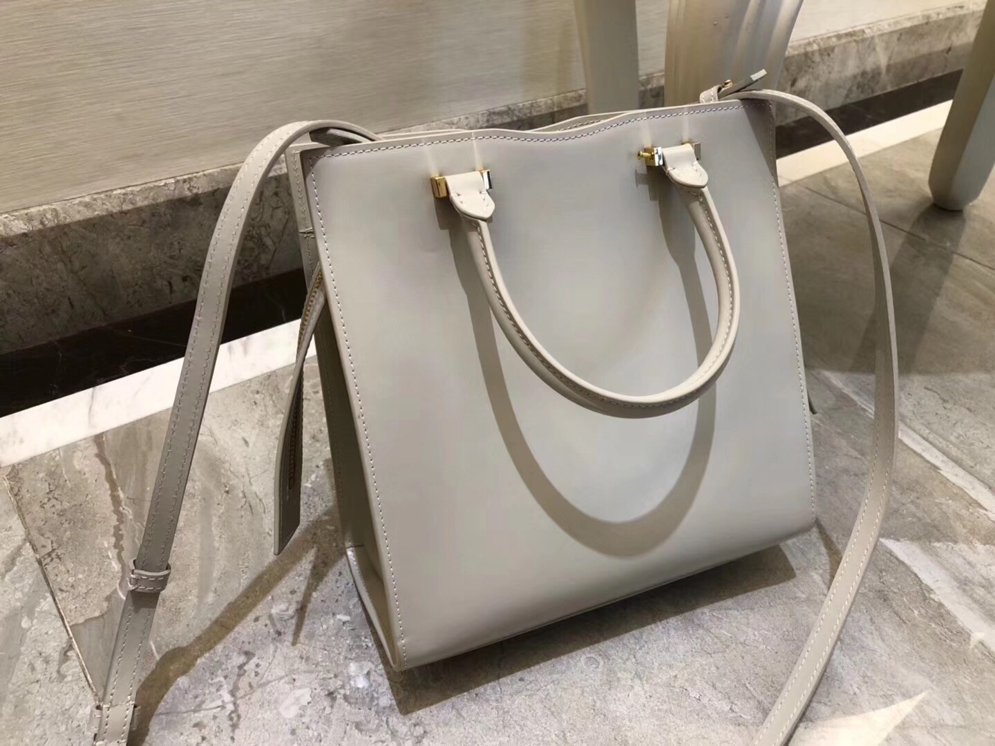 Sa**t Lau*nt small uptown tote in blanc calfskin