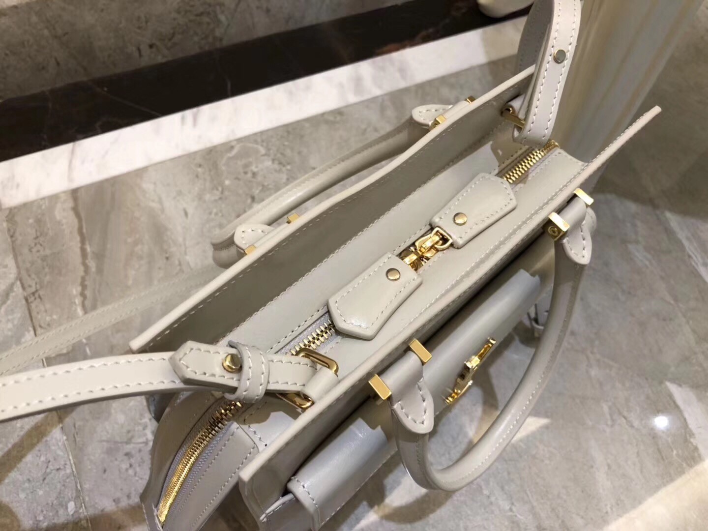 Sa**t Lau*nt small uptown tote in blanc calfskin