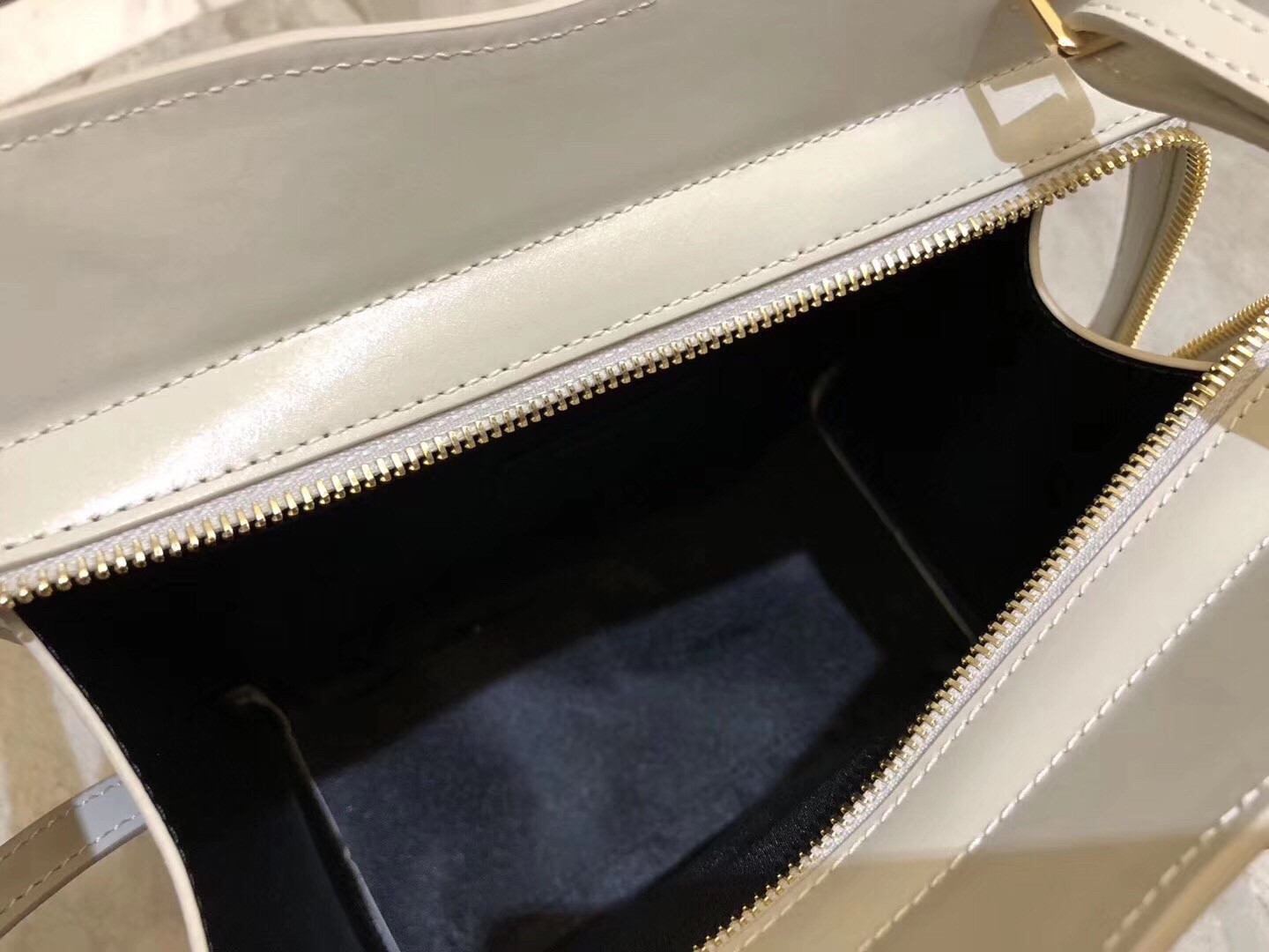 Sa**t Lau*nt small uptown tote in blanc calfskin